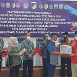 Wabub Donggala Terima Piagam WTP